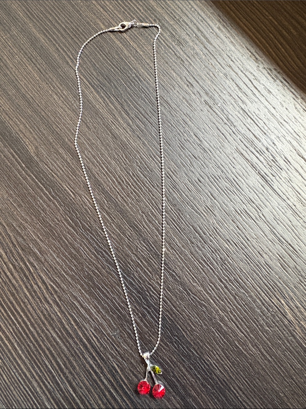 Silver Cherry Pendant Necklace with Red and Green Accents